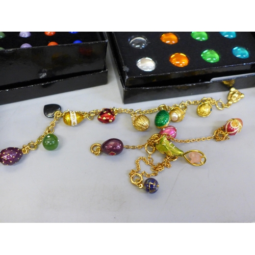 671 - Joan Rivers costume jewellery; five egg necklaces, a boxed set of earrings and interchangeable colou... 