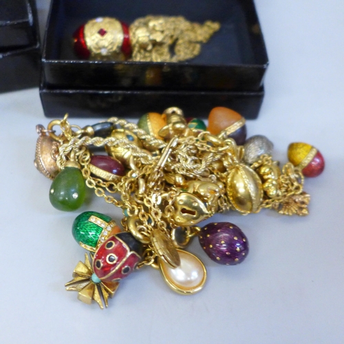 671 - Joan Rivers costume jewellery; five egg necklaces, a boxed set of earrings and interchangeable colou... 