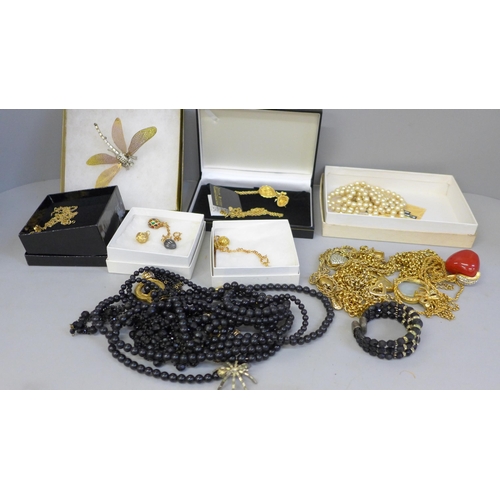 677 - Five boxes of costume jewellery; two Alexandra Elliot egg charms, Lee Sands, two Joan Rivers Classic... 