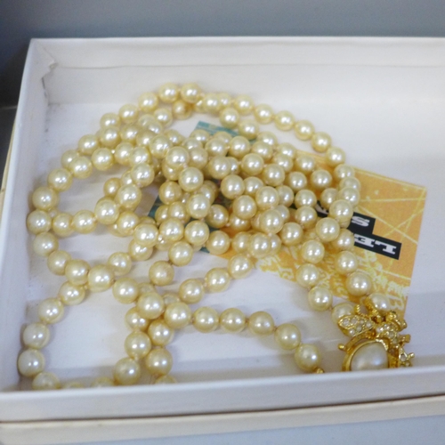 677 - Five boxes of costume jewellery; two Alexandra Elliot egg charms, Lee Sands, two Joan Rivers Classic... 