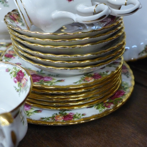 684 - A collection of Royal Albert Old Country Roses, part tea set, picture frame, cake stand, etc., one v... 