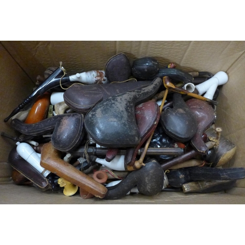 709 - A collection of pipes including clay, Petersons, cheroot holders, empty pipe boxes, some pipes with ... 