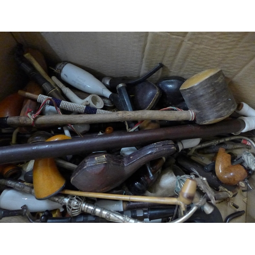 709 - A collection of pipes including clay, Petersons, cheroot holders, empty pipe boxes, some pipes with ... 