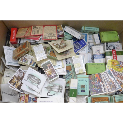 714 - A large collection of vintage and new cigarette boxes, cigarette cards, collectors cards, part sets ... 