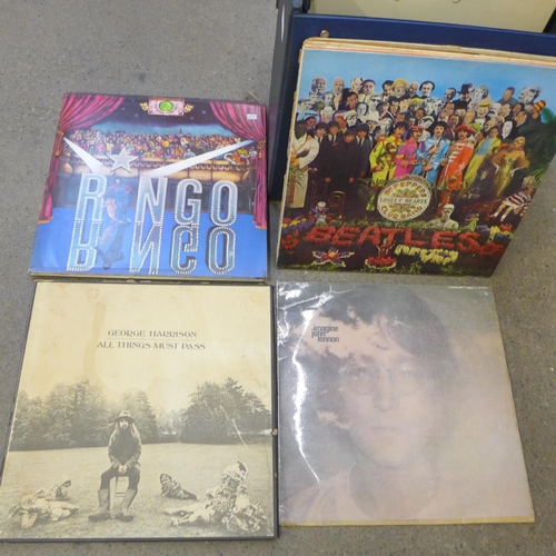 729 - A case of LP records (22), including The Beatles, Elton John and Neil Young