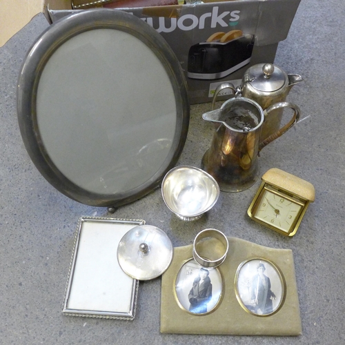 730 - A silver napkin ring, a silver lid and plated ware