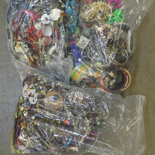 735 - Three large bags of costume jewellery