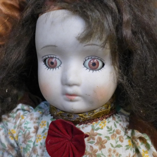 742 - A collection of mid-20th Century dolls, spare limbs, etc.