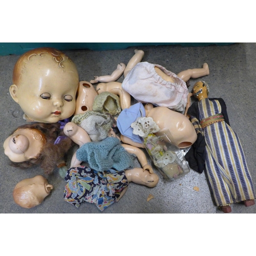 742 - A collection of mid-20th Century dolls, spare limbs, etc.