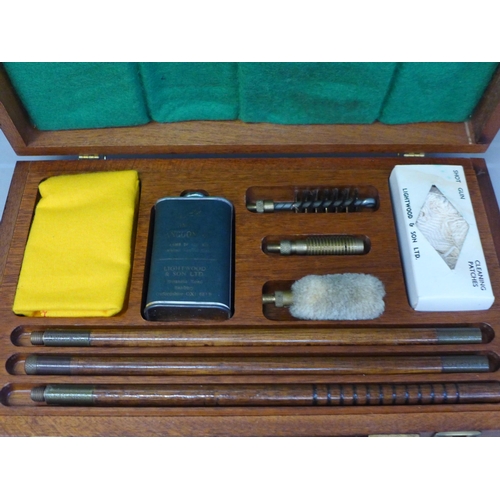 759 - A 12-bore shot gun cleaning kit, cased
