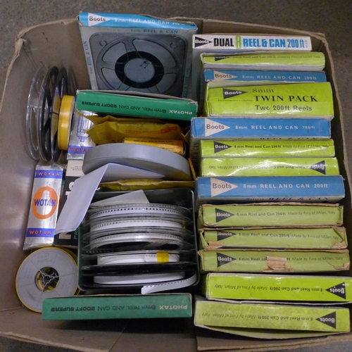 767 - Thirty-one 8mm film reels, 1960s and three projector lamp bulbs