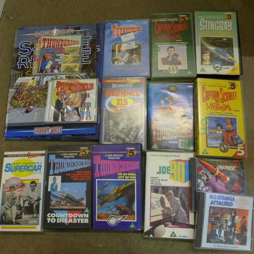 769 - A collection of Gerry Anderson mechandise including Thunderbirds, Captain Scarlet, Stingray, etc.