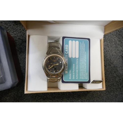 779 - A box of mixed fashion wristwatches and a lady's cameo jewellery set