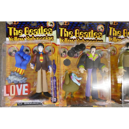 784 - The Beatles Yellow Submarine McFarlane Toys figures, in original boxes, in original postage box date... 