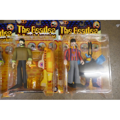 784 - The Beatles Yellow Submarine McFarlane Toys figures, in original boxes, in original postage box date... 