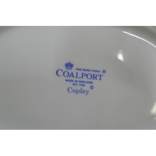 793 - A Coalport Copley dinner service, six setting with oval serving plates, bowls and gravy boat, one so... 