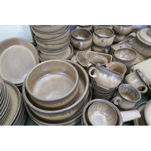 794 - A large collection of Denby Romany pottery dinner and teawares; 13 dinner, 16 tea, 10 medium plates,... 