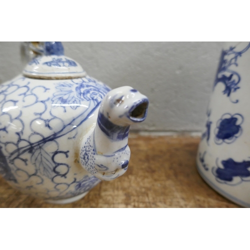 796 - Three items of Chinese blue and white pottery; cylindrical tea caddy, a/f, tea pot and small lidded ... 