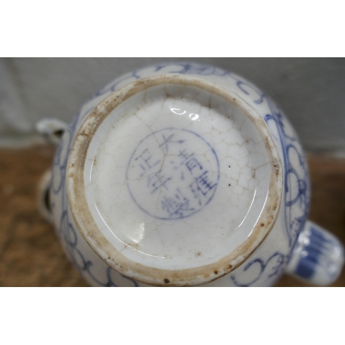 796 - Three items of Chinese blue and white pottery; cylindrical tea caddy, a/f, tea pot and small lidded ... 