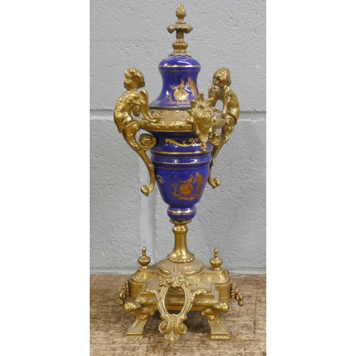 799 - A French Sèvres style three piece gilt bronze and porcelain clock garniture, with decorative ceramic... 