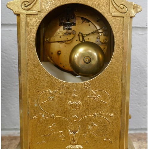 799 - A French Sèvres style three piece gilt bronze and porcelain clock garniture, with decorative ceramic... 