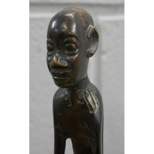 800 - A bronze figure of an African tribesman