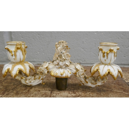 814 - A pair of porcelain candelabra tops