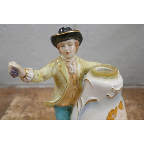 815 - Four German porcelain figural candle holders