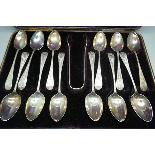 830 - A cased set of twelve spoons and sugar bows