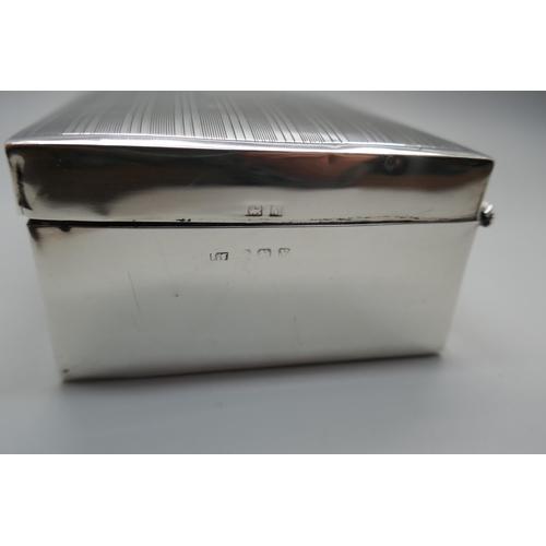 831 - A silver cigarette box with engine turned decoration to lid, gross weight 247g, a/f (lid)