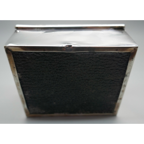 831 - A silver cigarette box with engine turned decoration to lid, gross weight 247g, a/f (lid)