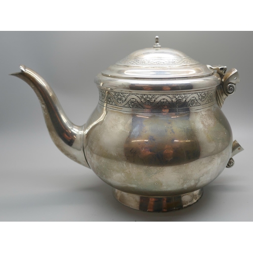 834 - A silver teapot, lacking handle, 619g