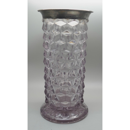 841 - A silver rimmed glass vase