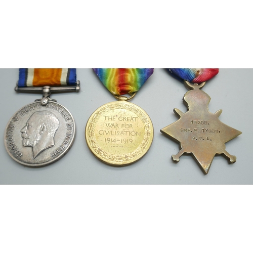 847 - A group of WWI medals to 19200 Gnr. F. Tyson, R.A. and a 1914 Christmas 1914