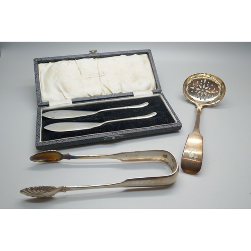 853 - A pair of William IV Scottish silver sugar bows, Glasgow 1836, Daniel Robertson, a pair of silver bu... 