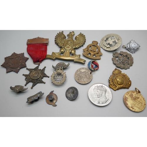 856 - A collection of military badges, etc.