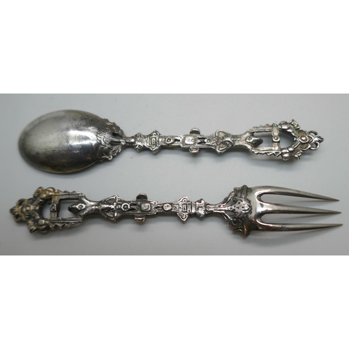 857 - An ornate German caste silver spoon and fork, 46g