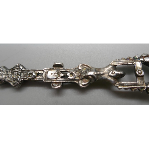 857 - An ornate German caste silver spoon and fork, 46g