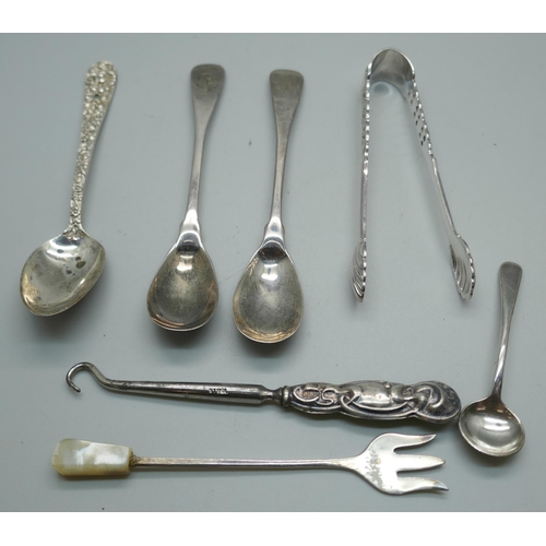 861 - A pair of Irish silver mustard spoons, Dublin 1813,  a silver salt spoon, a pair of 830 silver sugar... 