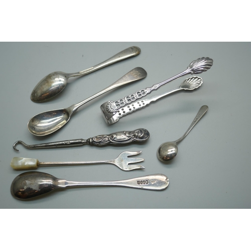 861 - A pair of Irish silver mustard spoons, Dublin 1813,  a silver salt spoon, a pair of 830 silver sugar... 