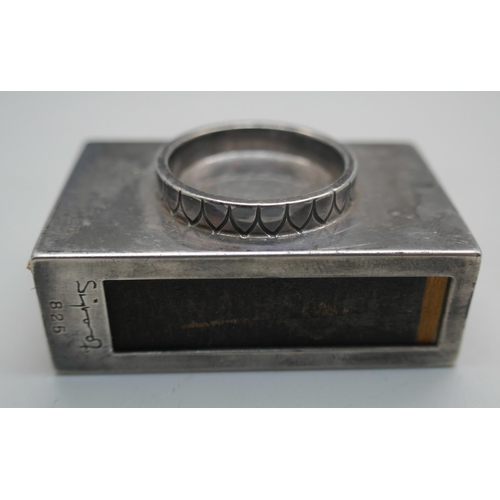 863 - A silver Georg Jensen matchbox holder signed Sigvaard Bernadotte, London import mark for 1962