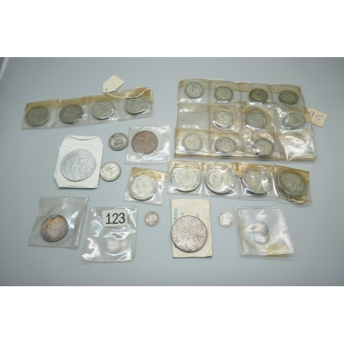 875 - Coins including a Victorian 1889 silver double florin, Victorian silver 3d coins, a 999.9 silver 197... 