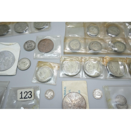 875 - Coins including a Victorian 1889 silver double florin, Victorian silver 3d coins, a 999.9 silver 197... 