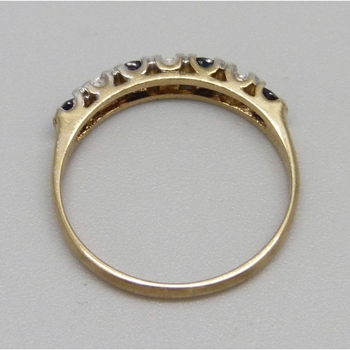 946 - A 9ct gold, sapphire and diamond ring, 1.4g, L