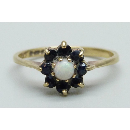 951 - A 9ct gold, sapphire and opal ring, 2.1g, O