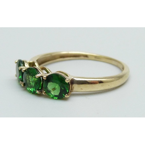 954 - A 9ct gold and three green stone ring, 1.9g, P