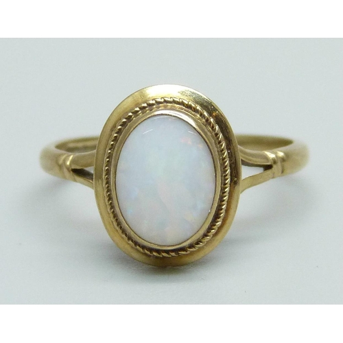 956 - A 9ct gold and opal ring, 1.6g, J