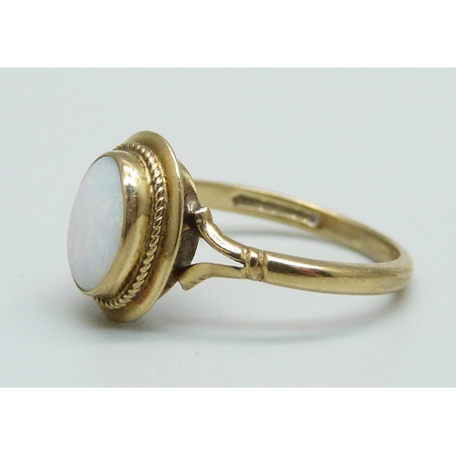 956 - A 9ct gold and opal ring, 1.6g, J