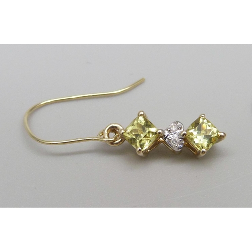 964 - A pair of 9ct gold, yellow garnet and diamond drop earrings, 1.5g