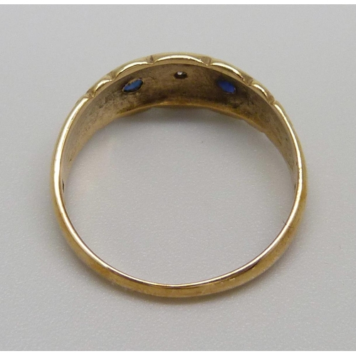 965 - A 9ct gold set sapphire and diamond ring, 2.1g, M